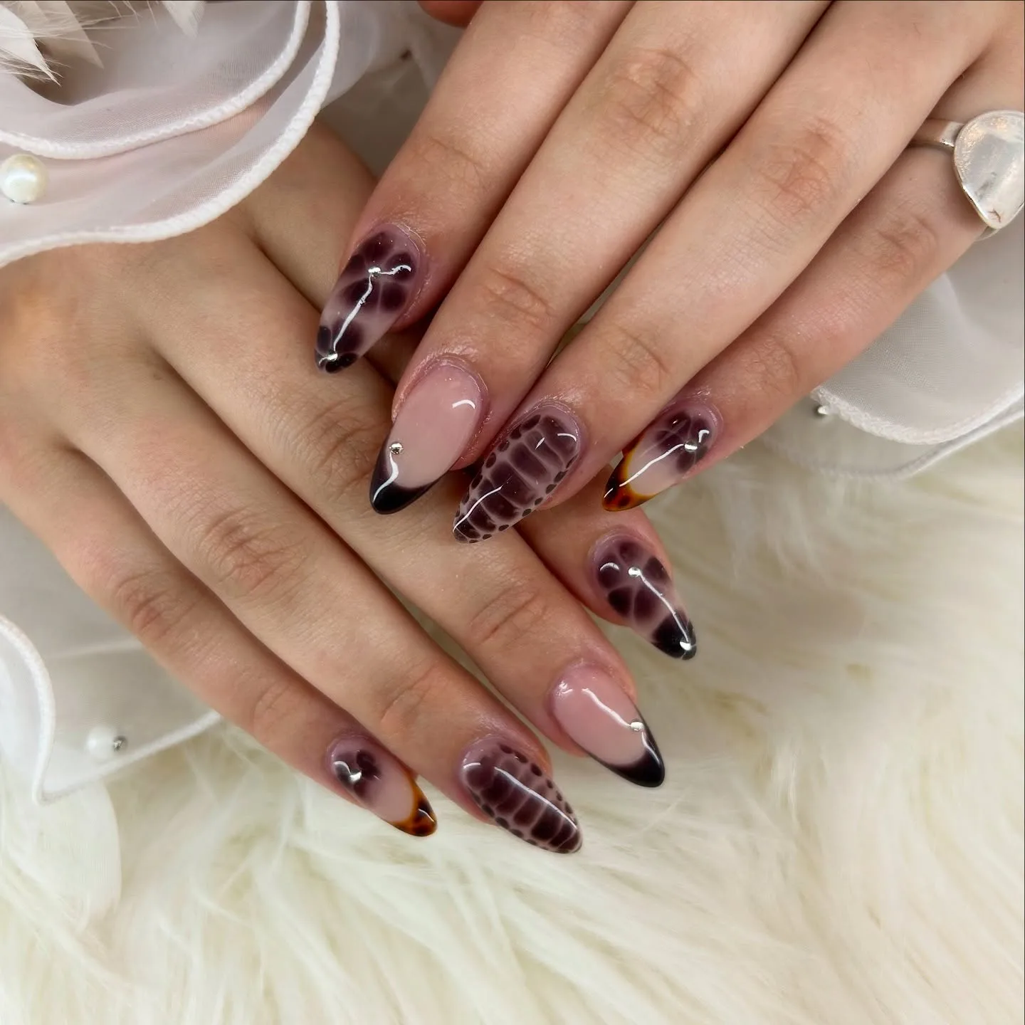 Purple black smoke nails with snakeskin and tortoiseshell French tips